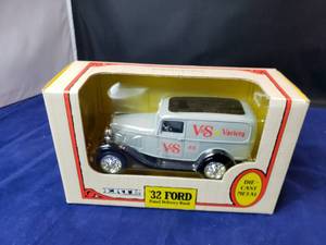 lot 21 image: V&S Variety 1932 Ford Panel Delivery Truck Bank by Ertl Die-Cast Metal