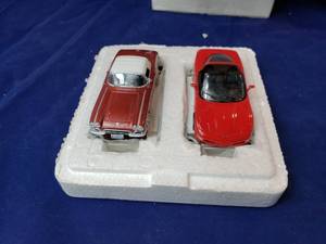 lot 27 image: 1962 Danbury Mint 4 Corvette wStand, Stand for 4 1979 Corvette, 1997 4 Danbury Mint Corvette wno Stand