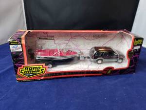 lot 39 image: Chevy Blazer and Ranger Boat Road Champs Truck and Trailer Series