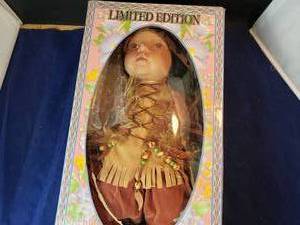 lot 75 image: Royal Cathay Collection Native American Child Porcelain Doll