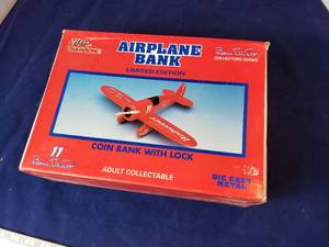 lot 83 image: Budweiser Racing Airplane Die Cast Bank
