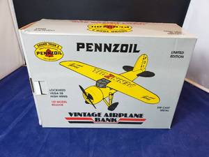 lot 84 image: Penzoil Lockheed Vega 5B High Wing Die Cast Airplane Bank