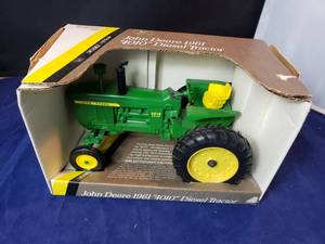 lot 100 image: 116 Ertl John Deere 1961 4010 Diesel Tractor, Die Cast