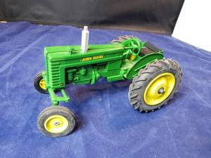 lot 105 image: Ertl John Deere Die Cast MT Tractor