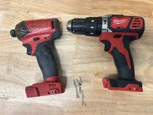 lot 25 image: MILWAUKEE M18 FUEL SURGE 18V Lithium-Ion Brushless Cordless 14 in. Hex Impact Driver with M18 18V Lithium-Ion Cordless 12 in. Hammer DrillDriver (Tools Only)