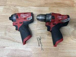 lot 26 image: MILWAUKEE M12 FUEL 14 Impact Driver and FUEL 12 Hammer DrillDriver (Tools Only)