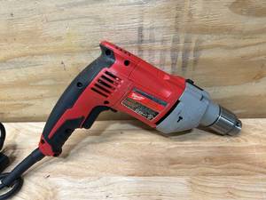 lot 34 image: MILWAUKEE 8 Amp Corded 12 in. Hammer Drill Driver