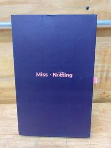 lot 73 image: MISS NOTTING 12 Pastel Wavy Dark Brown Natural Looking Wig