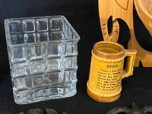 lot 60 image: Vintage Iron Trivets, Folding Elephant Basket, Coaster Set and More
