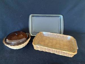 lot 152 image: Vintage Pyrex and Anchor Hocking Pans with Rattan Holders