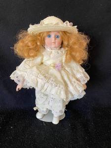 lot 216 image: Vintage Doll with Stand