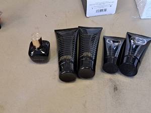 lot 1147 image: Lot of (5) Personal Care Products - All Over Shampoo, After Shave Balm, Shower Gel, Perfume