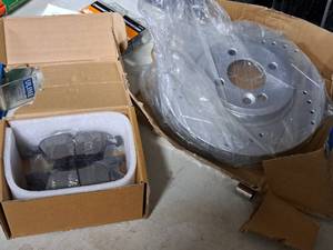 lot 226 image: Lot of (1 Set) Cross-Drilled Rotors and Disc Brake Pads (New)