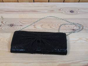 lot 156 image: Jessica McClintock Haley Metallic Clutch w Bow Detail