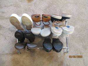 9 pair metal shoe rack with 8 pairs...