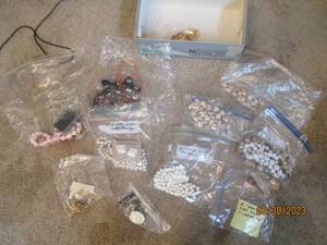 Shoebox full of jewelry, mostly bea...