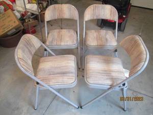 Set of (4) metal folding chairs eac...