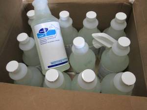 lot 74 image: 12 qt Bottles Diversey Crew Crew Ti...