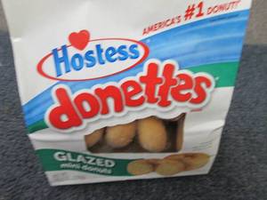 lot 141 image: 6- 10.5 oz Bags Hostess Donettes...