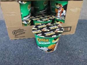 lot 151 image: 12- 2.25 oz pks Cheetos MacNCheese...