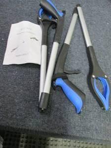 lot 389 image: 2 each Reacher Grabber...