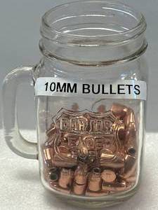 lot 8 image: Jar of 10mm Bullets