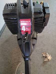 lot 94B image: MTD Pro 4 Cycle Trimmer