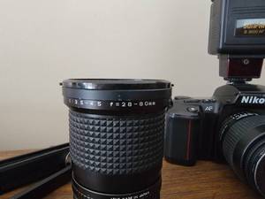 lot 28 image: Nikon N6006 Film Camera & Components