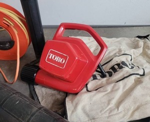 lot 94A image: Toro Rake-O-Vac Lawn BlowerVacuum 550 TBX