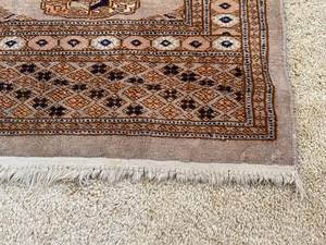 lot 115 image: Vintage Beige and Navy Bokara Geometric Pakistani Rug