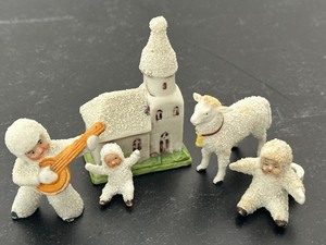 lot 64 image: Antique Victorian Snow Baby Figurines