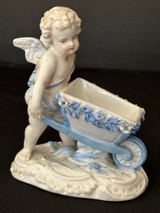 lot 56 image: Antique Victorian Porcelain Fairing Cherub Figurine