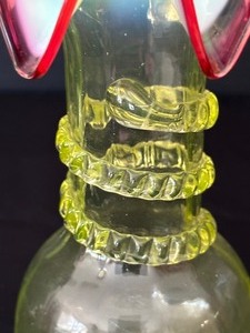 lot 54A image: Antique Rubina Verde Glass Vase with Applied Feet and Coil