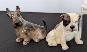 lot 226 image: Collection of Royal Doulton Porcelain Dog Figurines