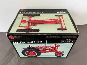 lot 24 image: McCormick-Deering Farmall F-20 in box