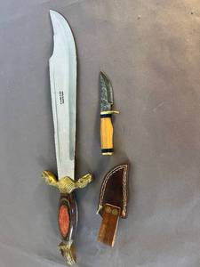 lot 54 image: 2 imposing knivesscabbard and sheath