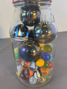 lot 56 image: jar of glass marbles
