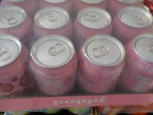 lot 203 image: 12 pack Poppi Prebiotic Raspberry R...