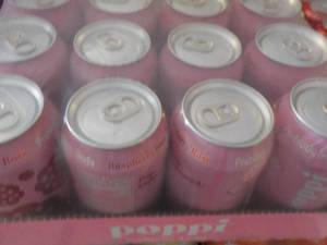 lot 204 image: 12 pack Poppi Prebiotic Raspberry R...