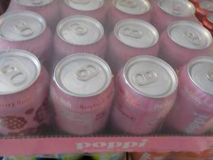 lot 205 image: 12 pack Poppi Prebiotic Raspberry R...