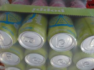 lot 207 image: 12 pack Poppi Prebiotic Ginger Lime...