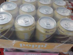 lot 209 image: 12 pack Poppi Prebiotic Root beer S...