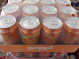 lot 217 image: 12 pack Poppi Prebiotic Orange Soda...