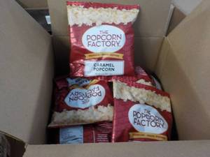 lot 312 image: Box of 2 oz Bags The Popcorn Factor...