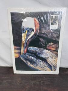 lot 36 image: Signed And Numbered Print Pelican At Dawn By Ronald T. Ladzinski II