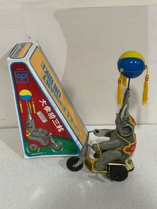 Collectible Wind-Up Elephant on Bike