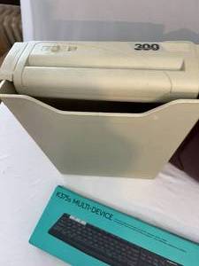 lot 98 image: Vintage Briefcase, Logitech Keyboard, and Paper Shredder