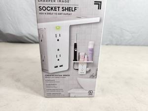 lot 66 image: New Sharper Image Socket Shelf