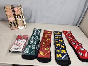 lot 201 image: New Kardashian Belly Bandits and New Rock Em Team Socks