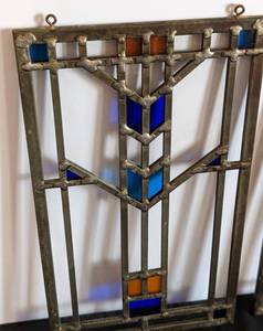 lot 33 image: Pair of Small Frank Lloyd Wright Style Stained Glass Panels